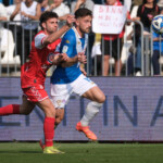 Niccolo Corrado of Brescia Calcio FC followed by Francesco Ruocco of Mantova 1911 during the Italian Serie B soccer championship football match between Brescia Calcio FC and Mantova 1911 at Mario Rigamonti Stadium on April 5, 2025, Brixia, Italy.